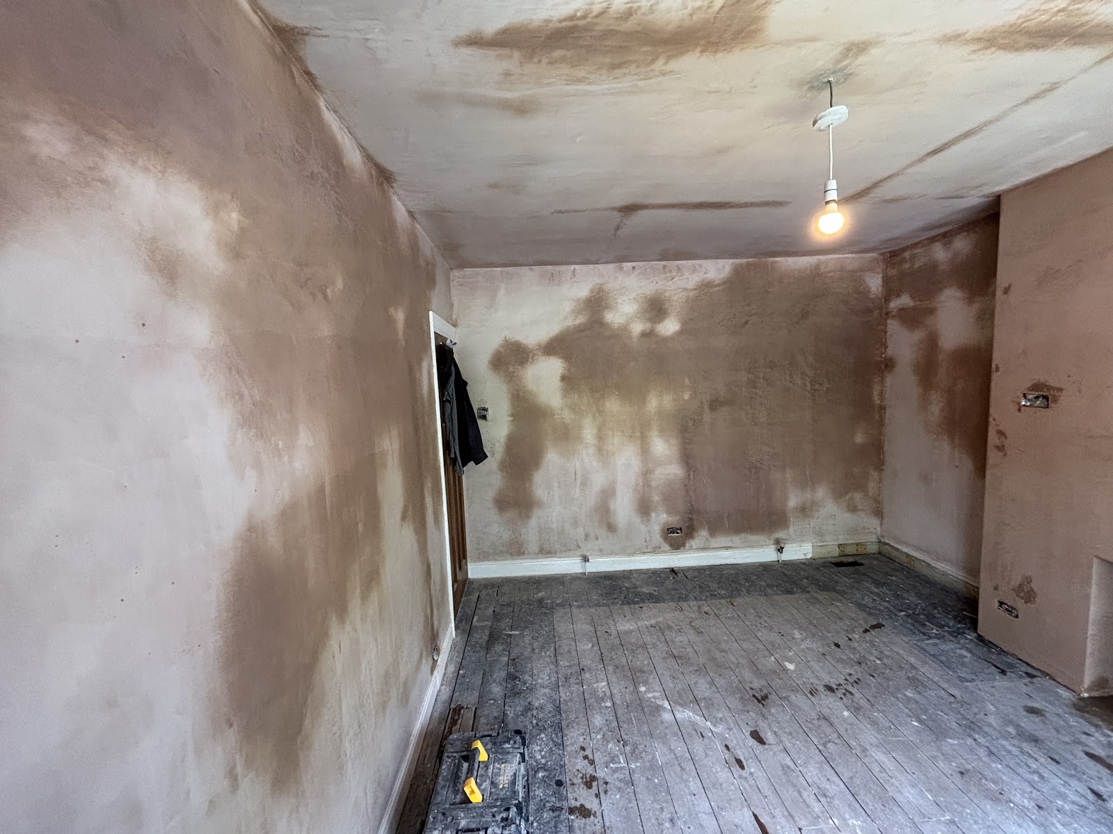 A room re-plastered after leak damage was made good