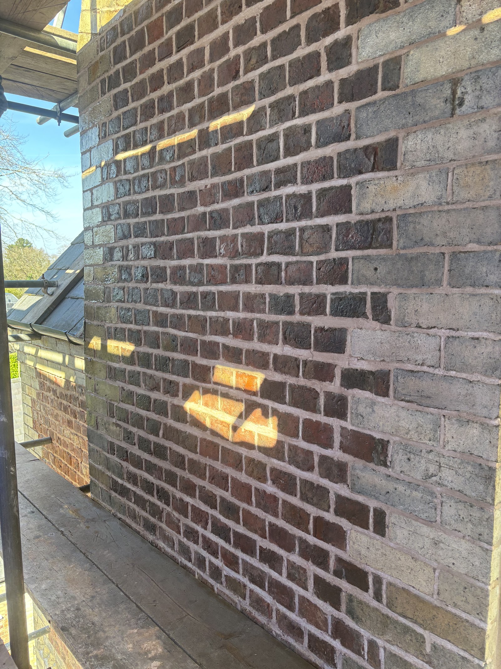Freshly repointed brickwork with clean, sharp mortar joints